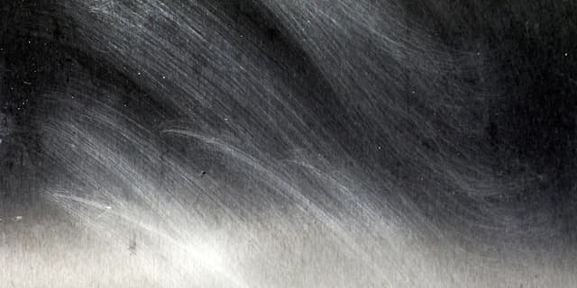 Close-up of dark raw iron surface